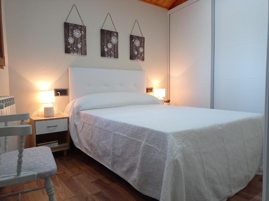 A bed or beds in a room at Magia en el Arco