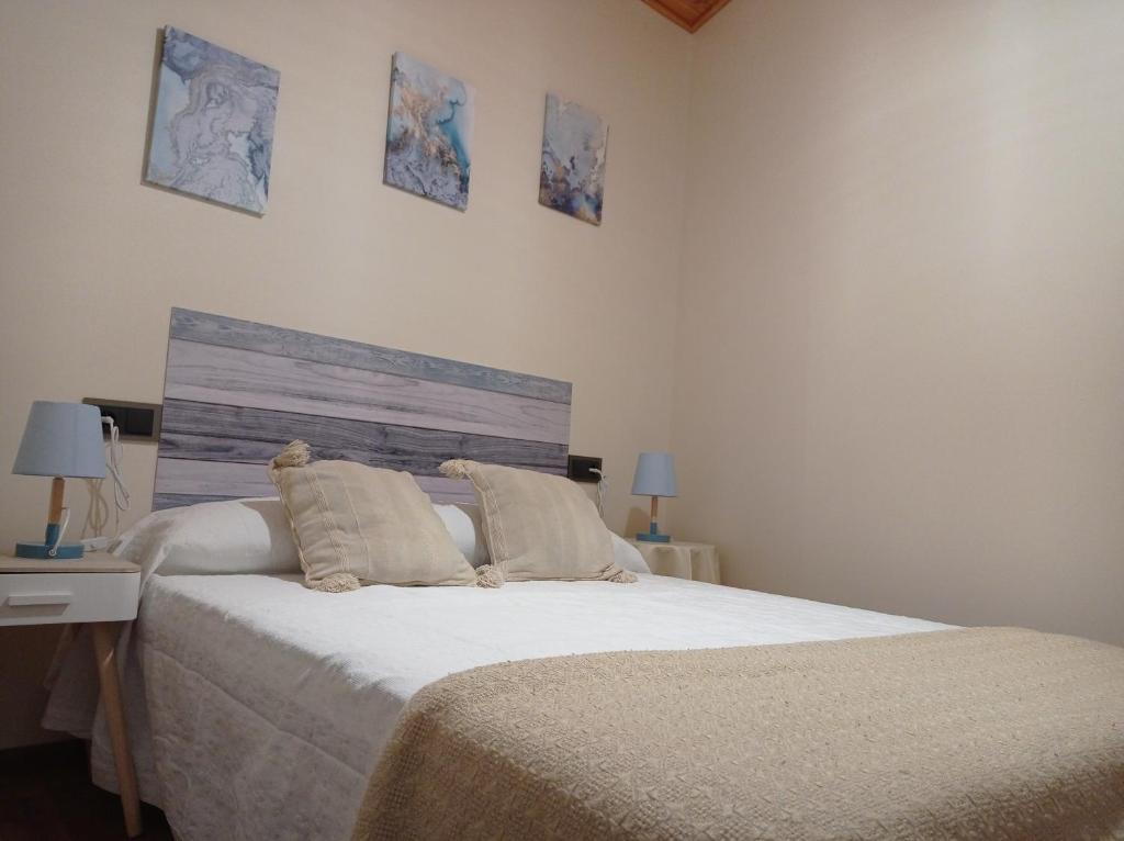 A bed or beds in a room at Magia en el Arco