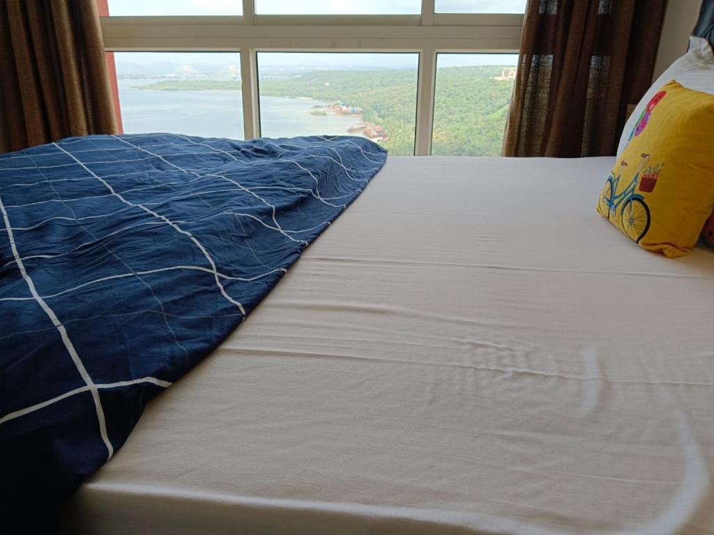 Postel nebo postele na pokoji v ubytování Nirvana Paraiso