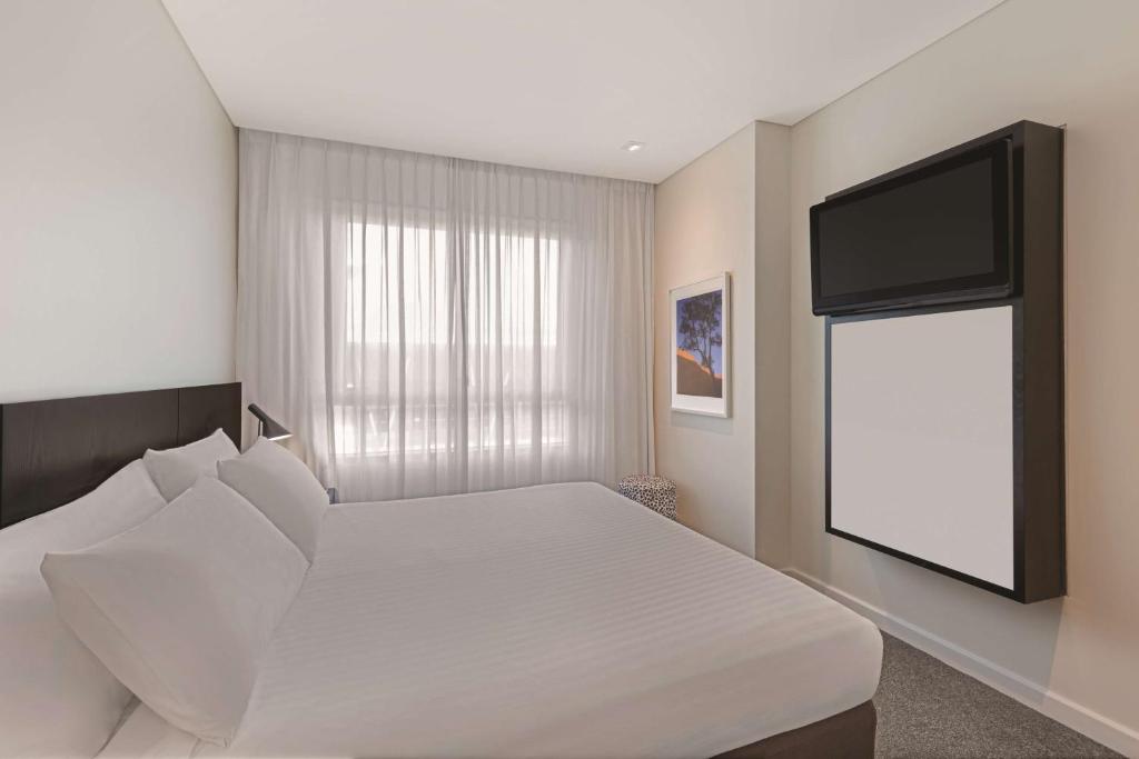 Kuchyň nebo kuchyňský kout v ubytování Adina Apartment Hotel Perth
