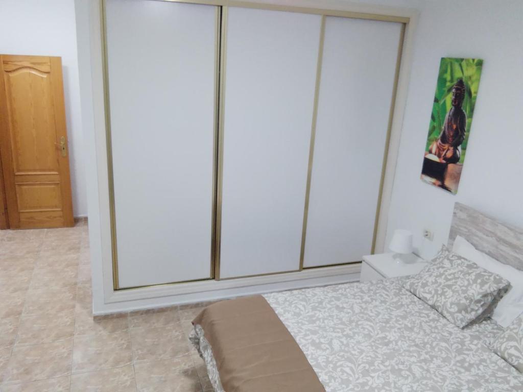 Postel nebo postele na pokoji v ubytování THREE BEDROOM APARTAMENT II NEAR SANTA CRUZ