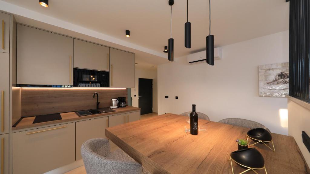 Kuchyň nebo kuchyňský kout v ubytování AdAstra Apartments