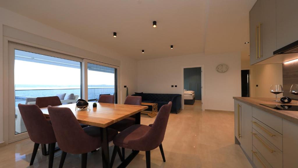 Kuchyň nebo kuchyňský kout v ubytování AdAstra Apartments