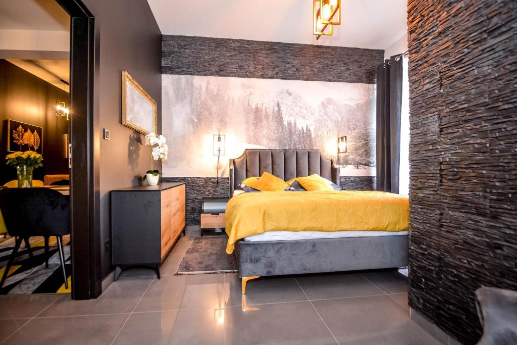 Postel nebo postele na pokoji v ubytování "CZARNA TURNIA"-Apartamenty