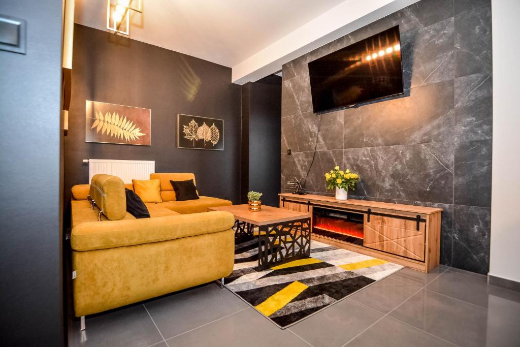 TV a/nebo společenská místnost v ubytování "CZARNA TURNIA"-Apartamenty