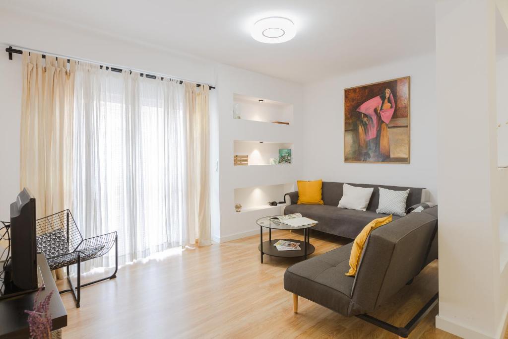 Posedenie v ubytovaní Malagaflat Design Apartment 3 Bedrooms City Centre