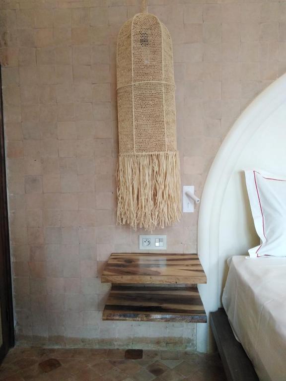 Postel nebo postele na pokoji v ubytování Riad Lalla Mimouna