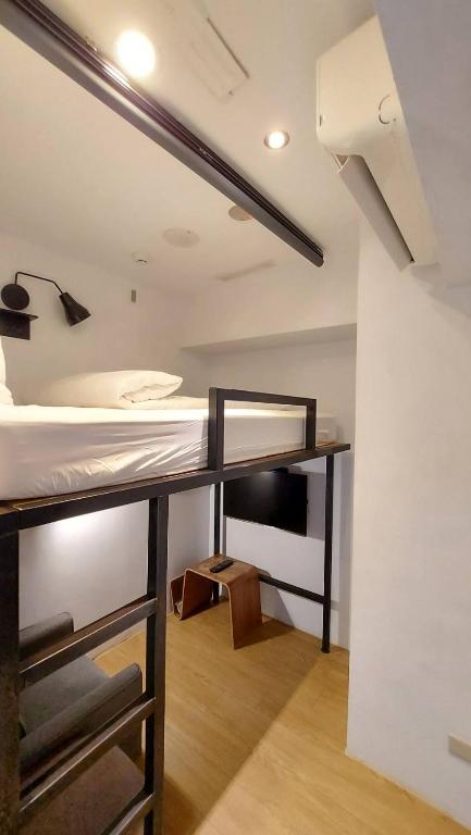 Postel nebo postele na pokoji v ubytování Daan Park Hotel