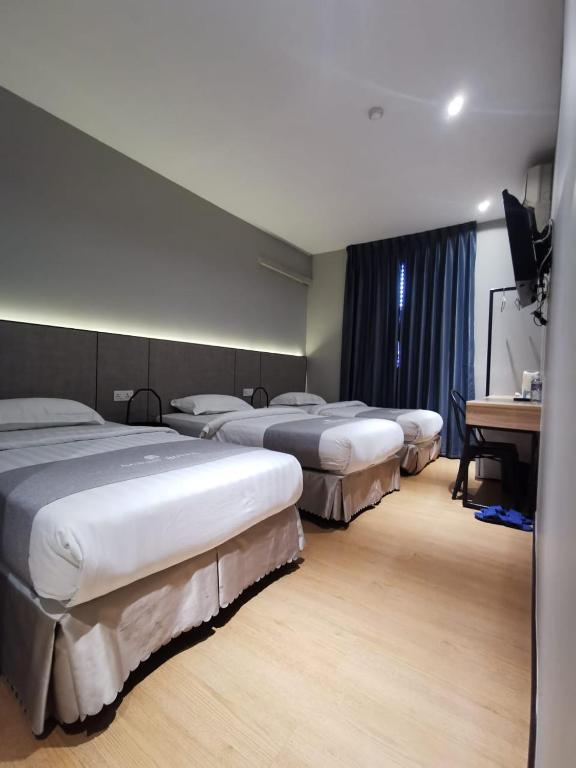 Postel nebo postele na pokoji v ubytování OCEAN HOTEL
