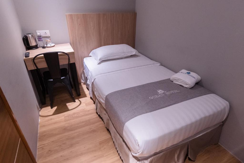 Postel nebo postele na pokoji v ubytování OCEAN HOTEL