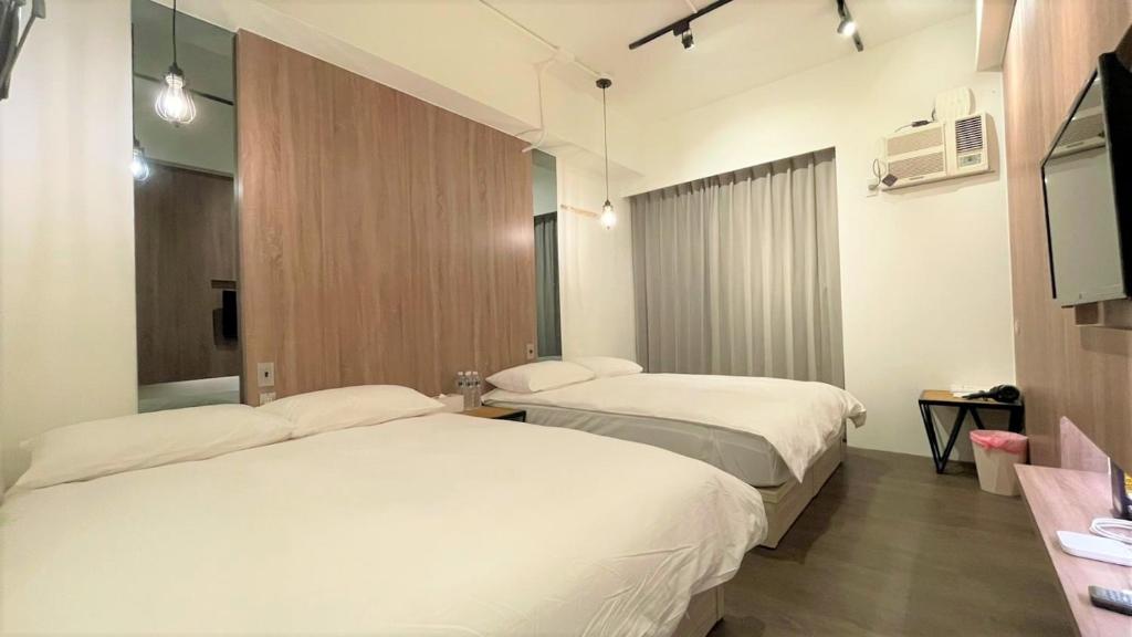 Postel nebo postele na pokoji v ubytování Sky Tree B&B