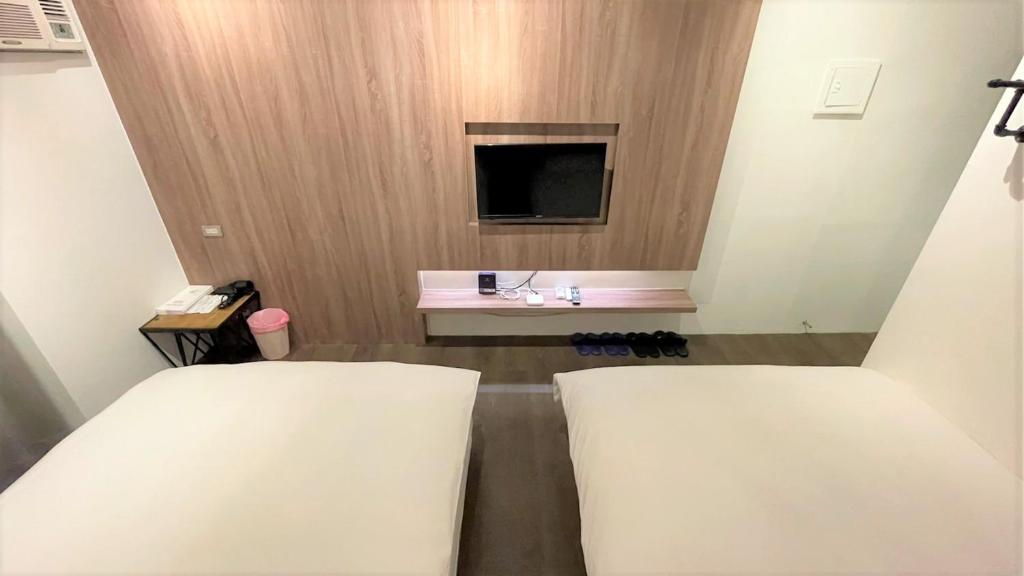 Postel nebo postele na pokoji v ubytování Sky Tree B&B