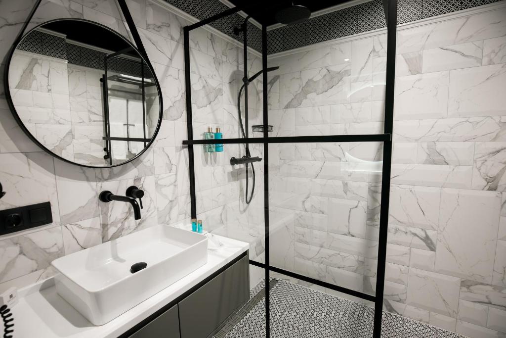 Koupelna v ubytování Victoria Deluxe Hotel