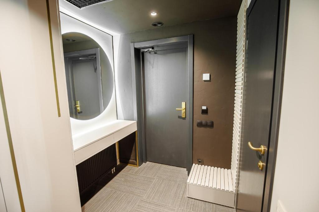 Koupelna v ubytování Victoria Deluxe Hotel