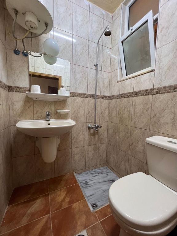 Koupelna v ubytování Dweik Hotel 1