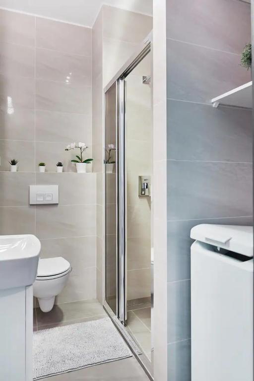 Kúpeľňa v ubytovaní P&O Serviced Apartments Siedmiogrodzka III
