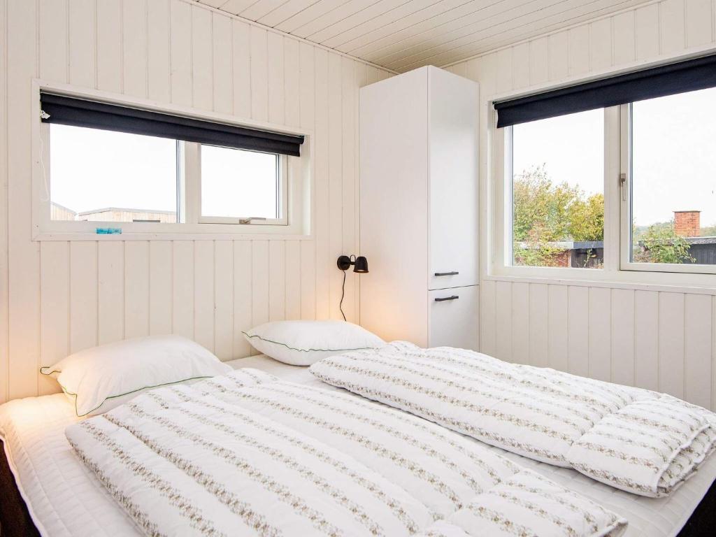 Postel nebo postele na pokoji v ubytování Luxury Seaside Retreat - By Traum Ferienwohnungen