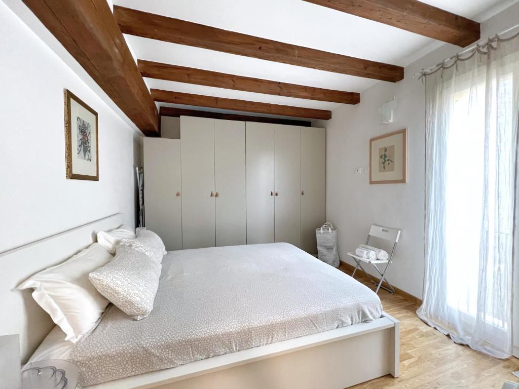 A bed or beds in a room at UR NEST Santo Stefano
