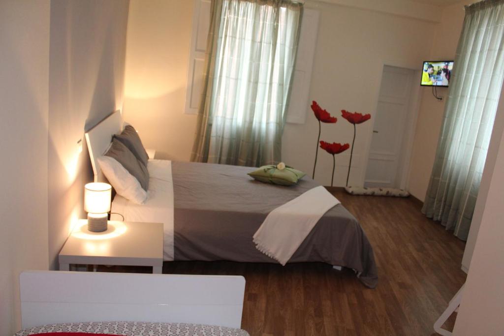 Posteľ alebo postele v izbe v ubytovaní L'Iris B&B