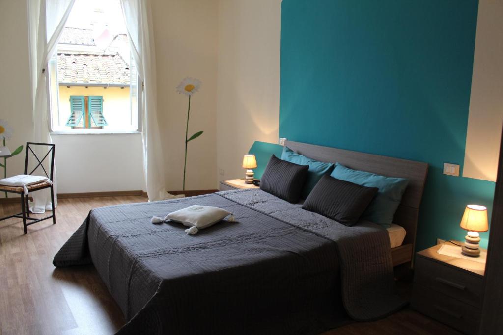 Posteľ alebo postele v izbe v ubytovaní L'Iris B&B