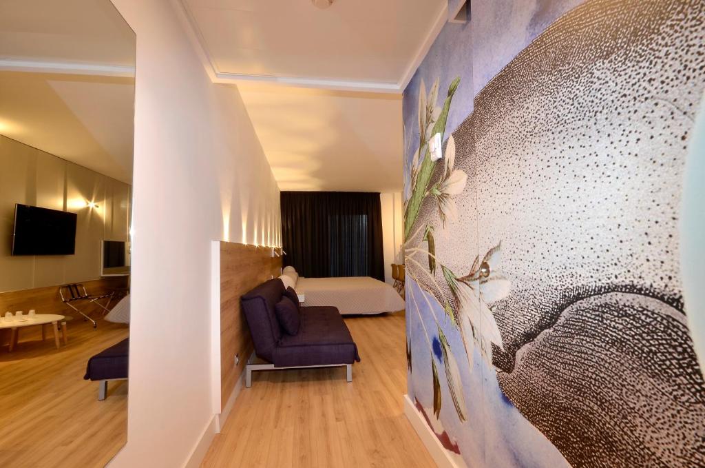 TV a/nebo společenská místnost v ubytování Hotel Olympus