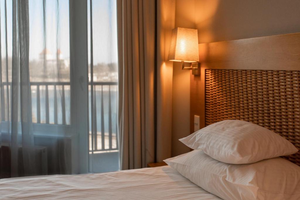 Voodi või voodid majutusasutuse Georg Ots Spa Hotel toas