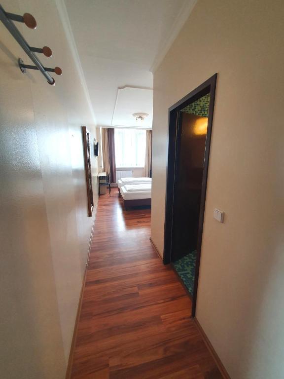 Postel nebo postele na pokoji v ubytování R&B Hotel
