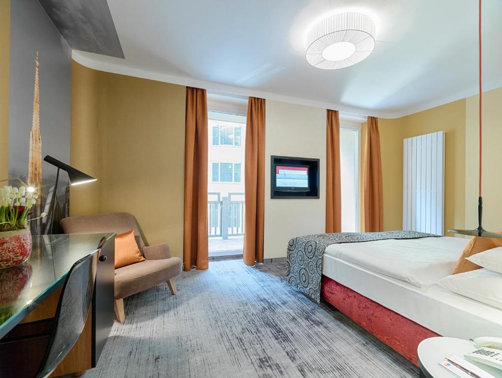 Posteľ alebo postele v izbe v ubytovaní Hotel Capricorno