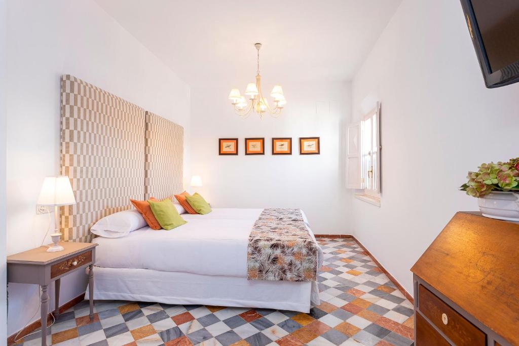 Posteľ alebo postele v izbe v ubytovaní Genteel Home Campamento
