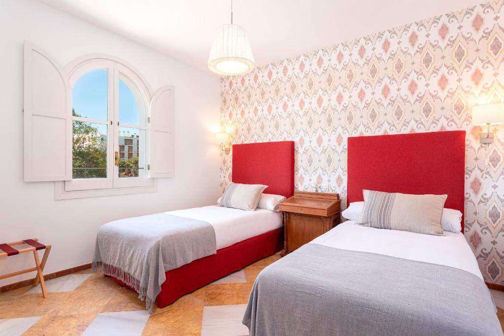 Posteľ alebo postele v izbe v ubytovaní Genteel Home Campamento