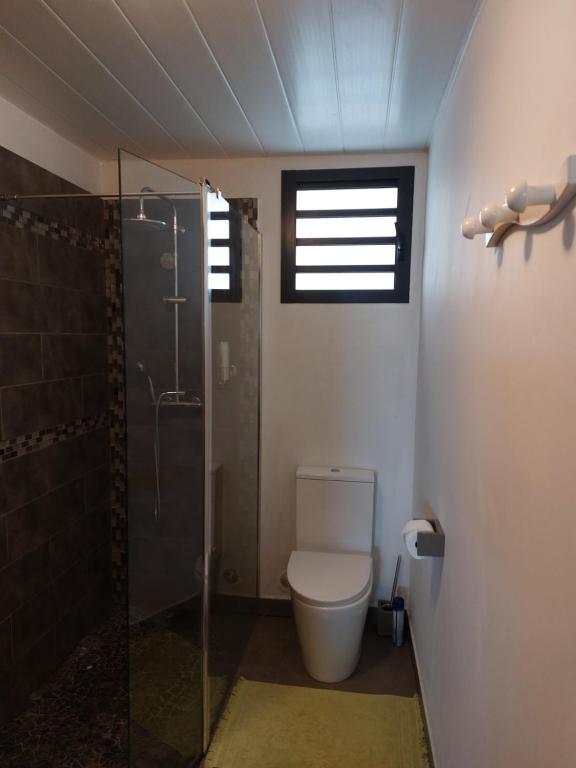 Koupelna v ubytování Nidamour, un logement fait pour vous