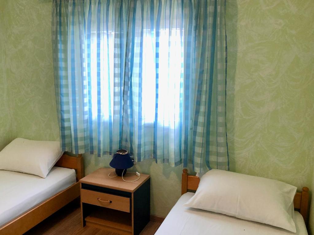 Posteľ alebo postele v izbe v ubytovaní Apartments Pine & Oak with shared seasonal hot tub