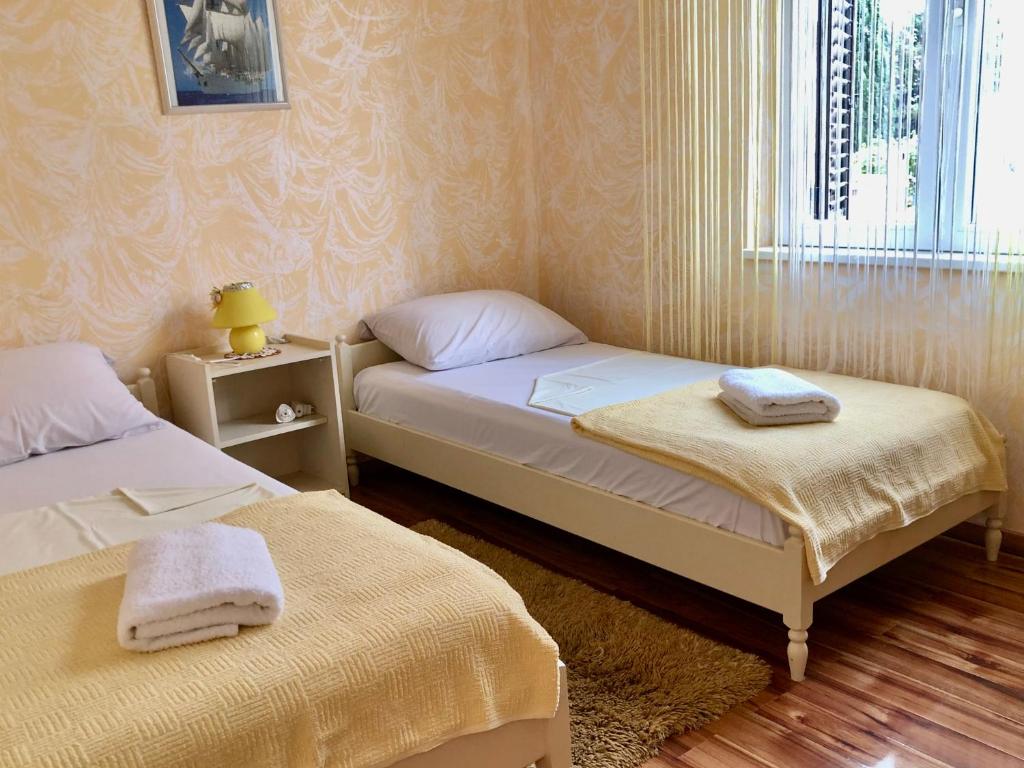 Posteľ alebo postele v izbe v ubytovaní Apartments Pine & Oak with shared seasonal hot tub