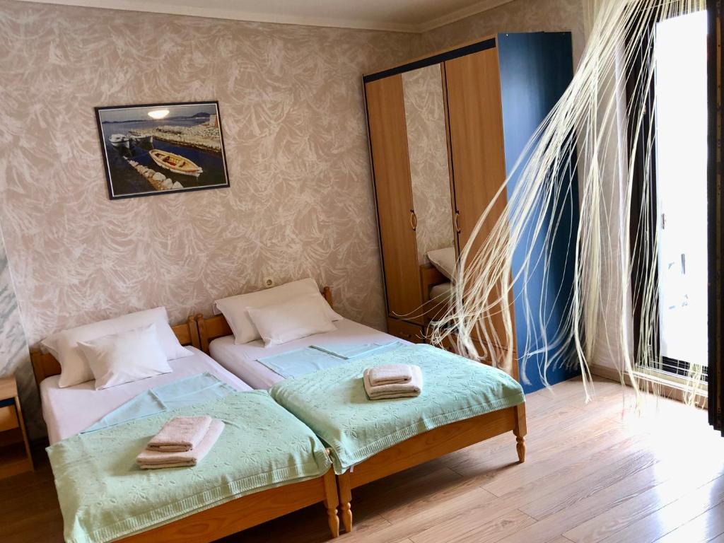 Posteľ alebo postele v izbe v ubytovaní Apartments Pine & Oak with shared seasonal hot tub