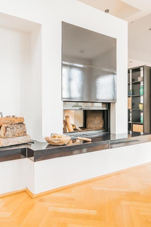 Kuchnia lub aneks kuchenny w obiekcie Penthouse apartment - Sauna - Terrasse - Kamin - AC