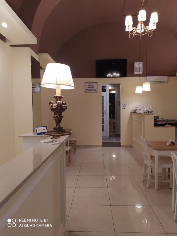 Kuchyň nebo kuchyňský kout v ubytování DONNA LUCREZIA b&b Boutique Hotel Style - relax & business stay