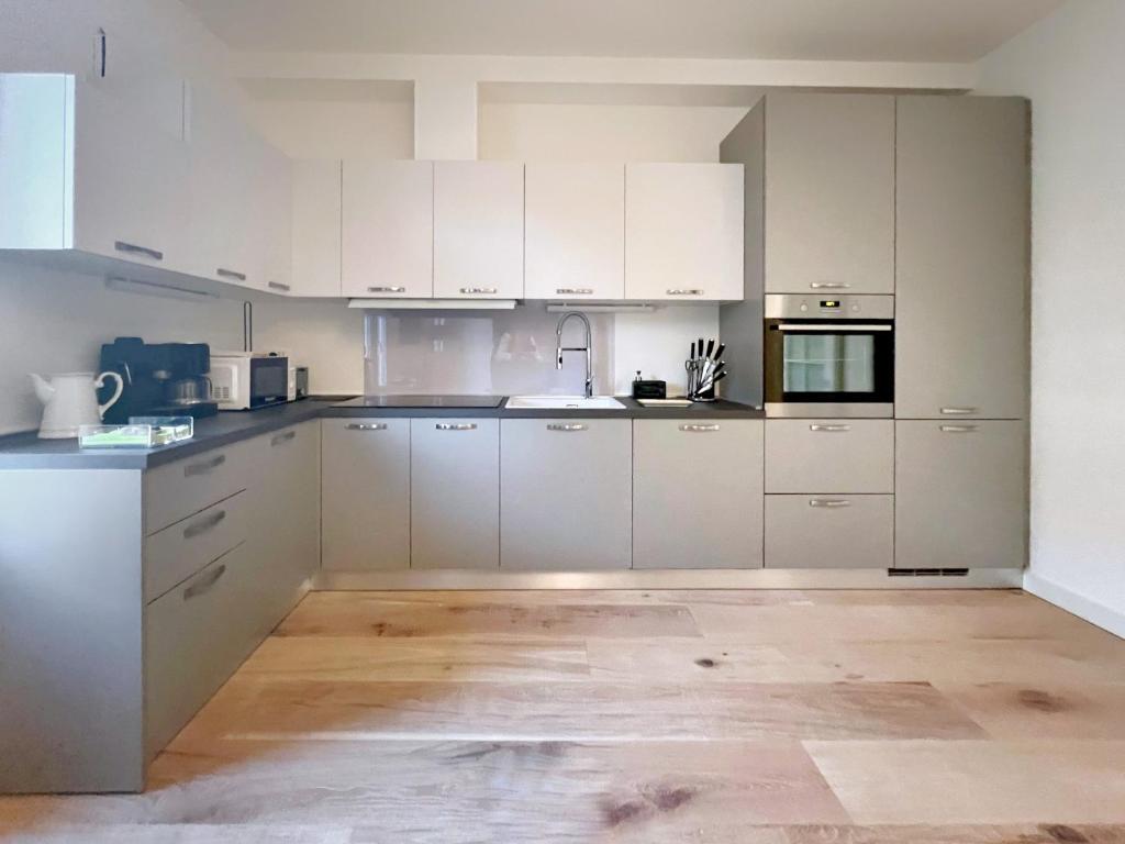 A kitchen or kitchenette at UR NEST San Giorgio
