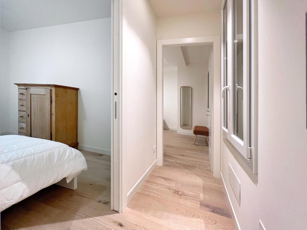 A bed or beds in a room at UR NEST San Giorgio