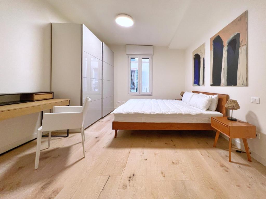 A bed or beds in a room at UR NEST San Giorgio