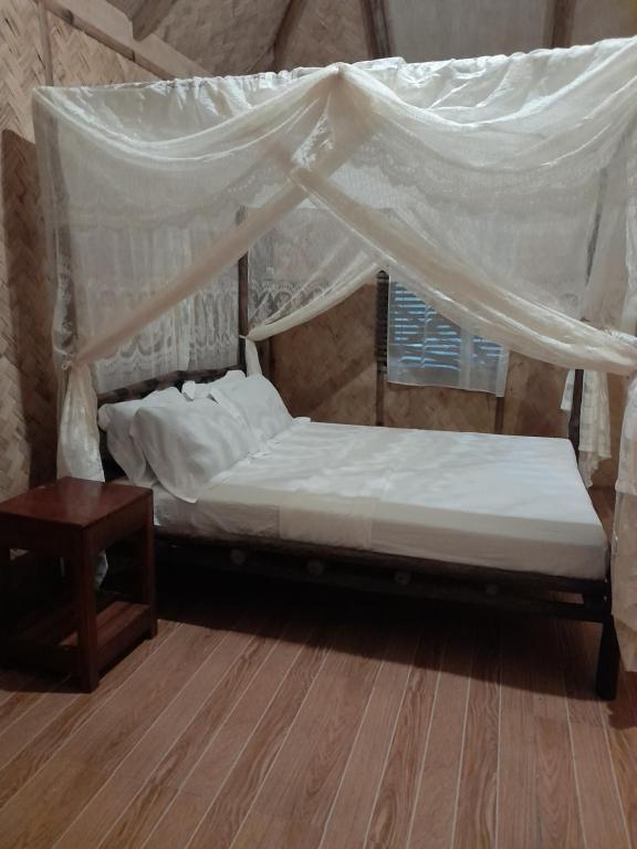 Erlittop Nature Lodge房間的床