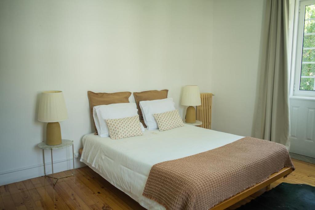 Postel nebo postele na pokoji v ubytování 3 Marias Residence
