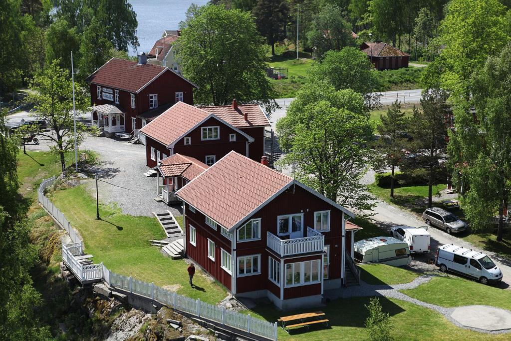 an overhead view of a house with a yard at Turistgården Töcksfors in Töcksfors