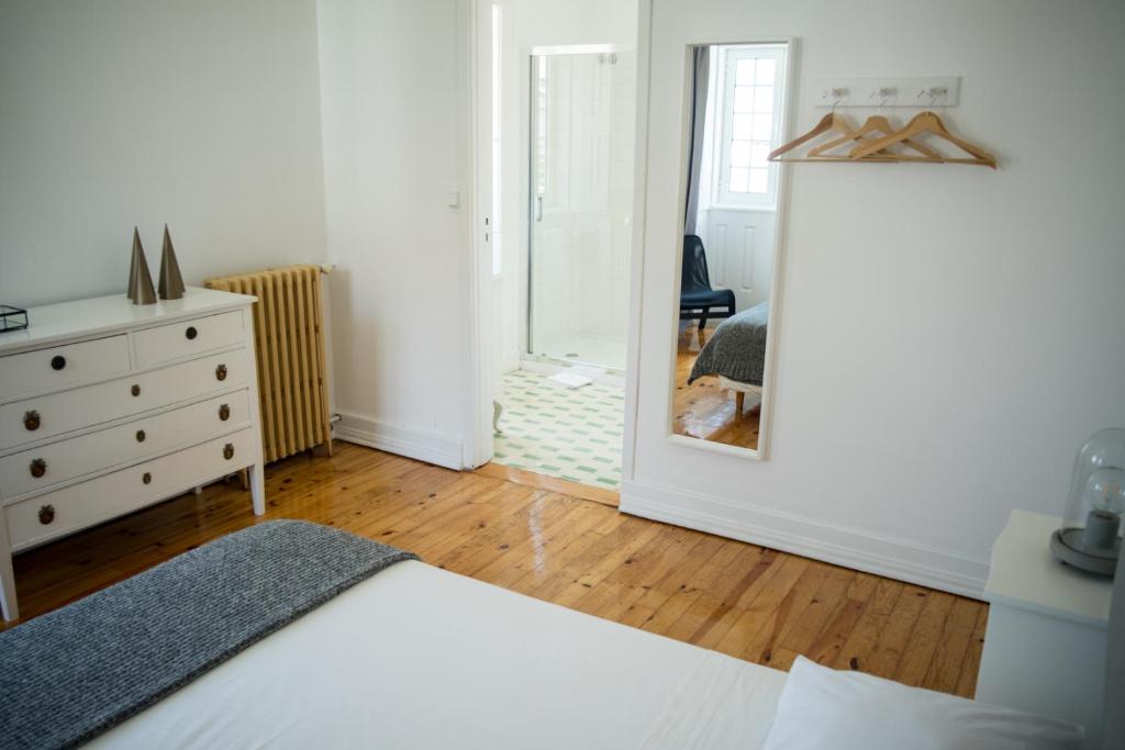 Postel nebo postele na pokoji v ubytování 3 Marias Residence