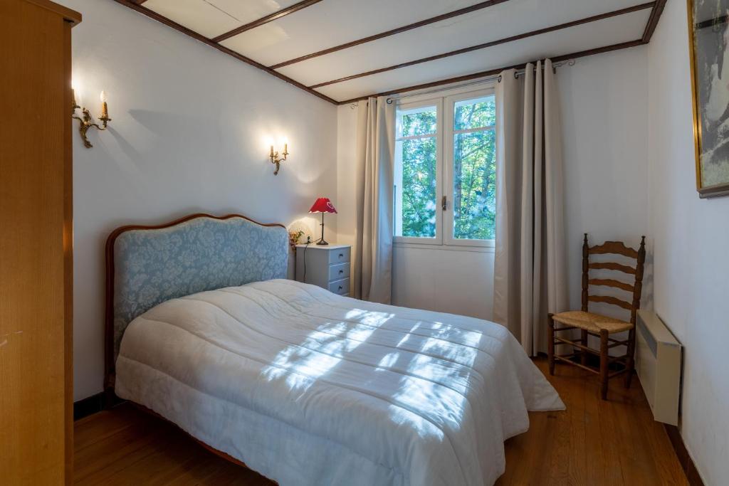 Postel nebo postele na pokoji v ubytování Chalet des Melezes