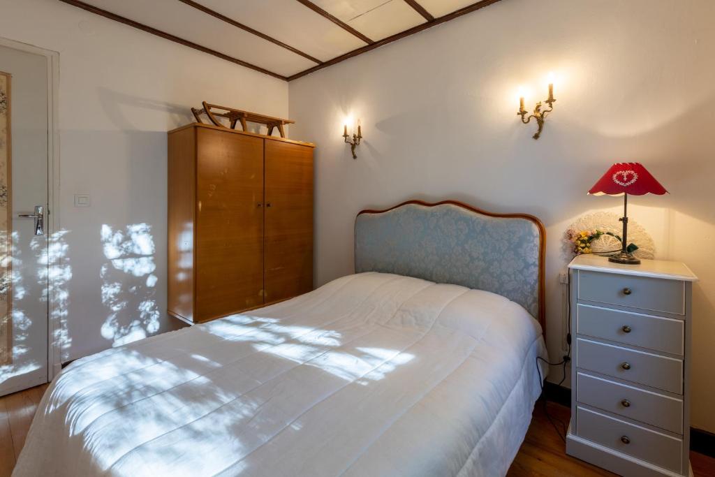 Postel nebo postele na pokoji v ubytování Chalet des Melezes