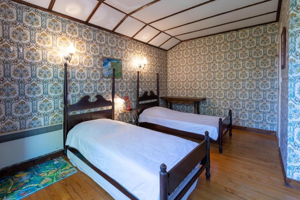 Postel nebo postele na pokoji v ubytování Chalet des Melezes