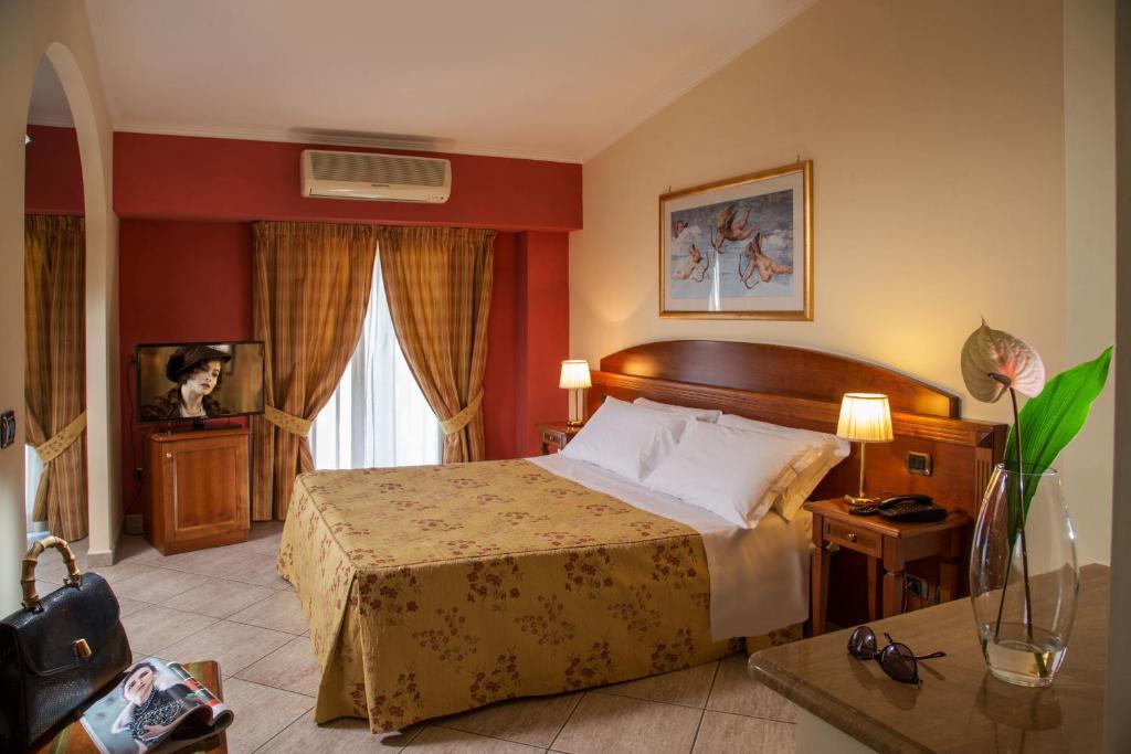 Postel nebo postele na pokoji v ubytování Marini Park Hotel