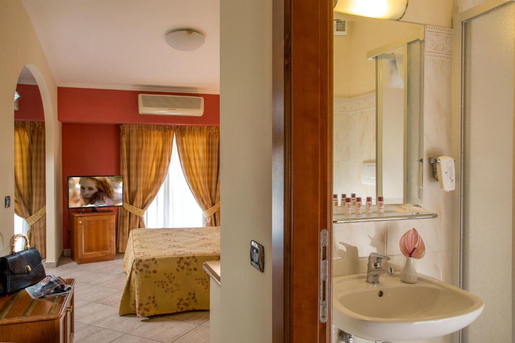 Postel nebo postele na pokoji v ubytování Marini Park Hotel
