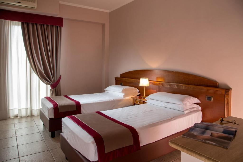 Postel nebo postele na pokoji v ubytování Marini Park Hotel