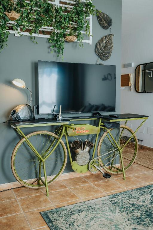 TV a/nebo společenská místnost v ubytování Casa Allegranza
